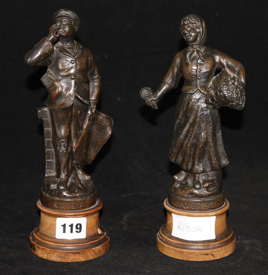 A pair of spelter figures of a man and lady
